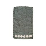 Beautiful hand-dyed itajime hemp moon linen hand towel in sage with undyed circles by kamppinen